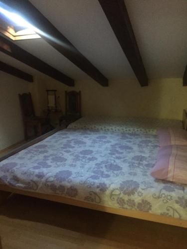 a bedroom with a large bed in a room at Apartments Tajana in Novigrad Istria
