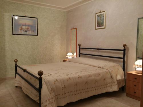 Ένα ή περισσότερα κρεβάτια σε δωμάτιο στο La Baronessa