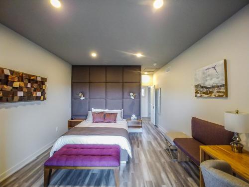 Кровать или кровати в номере Le Bellevue Modern Lodge
