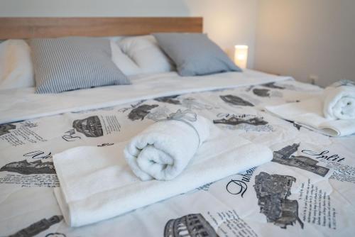 Postel nebo postele na pokoji v ubytování Apartmani Matej B