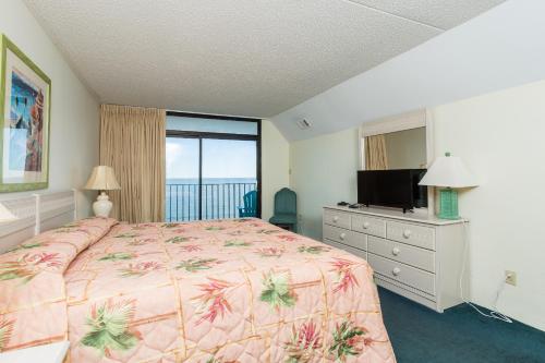 Giường trong phòng chung tại Ocean Towers Resort