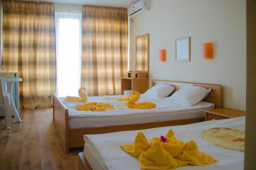 Posteľ alebo postele v izbe v ubytovaní Hotel Energy