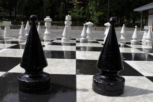 a chess board with black cones on it at Hotel Europa in Polanica-Zdrój