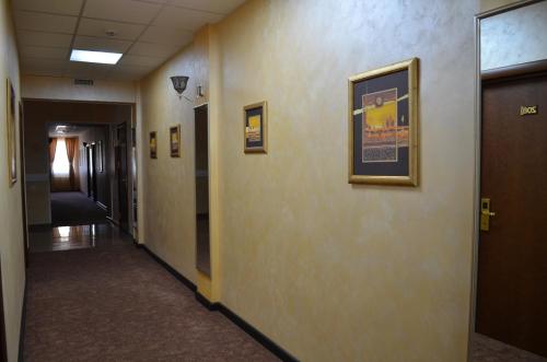a hallway in a hospital with at Mereke Hotel in Ustʼ-Kamenogorsk