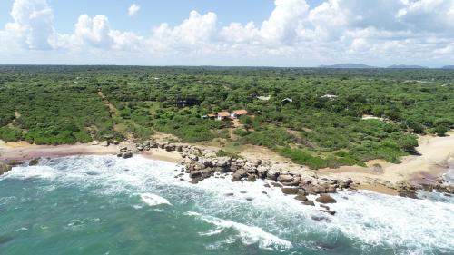 an aerial view of a beach with the ocean at Nil Sisila Beach Resort Yala in Yala