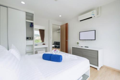 Postel nebo postele na pokoji v ubytování Ozone Condotel by RESAVA