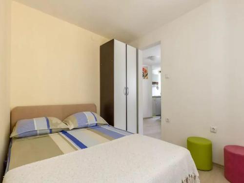 En eller flere senge i et værelse på Apartment Bova