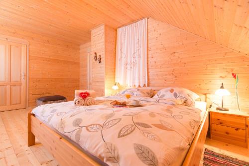 Ένα ή περισσότερα κρεβάτια σε δωμάτιο στο Holiday Home Kuća za odmor LEA - Ravna Gora