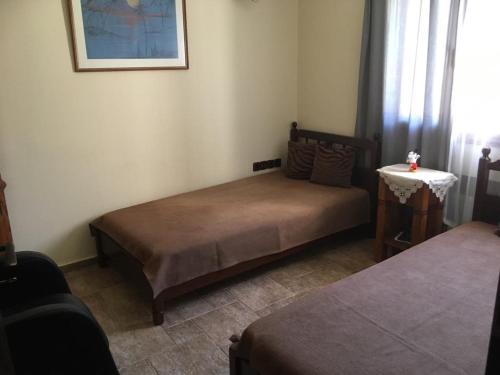Ένα ή περισσότερα κρεβάτια σε δωμάτιο στο Castel Villa