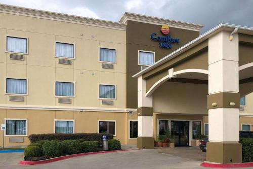 a hotel building with a courtyard inn sign on it at Comfort Inn Early Brownwood in Early