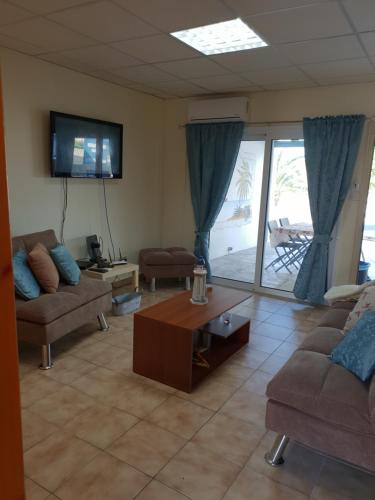 Χώρος καθιστικού στο Ikaria village-ground floor apartment No 4