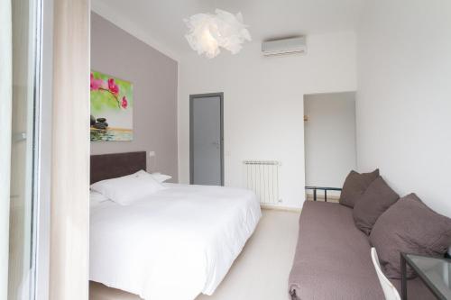 Postel nebo postele na pokoji v ubytování Hotel Spot Varazze