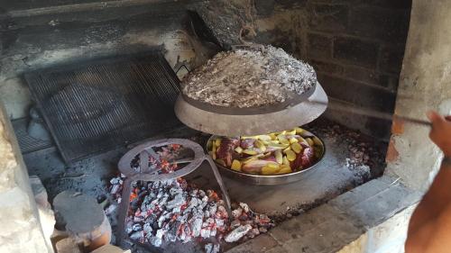 an overhead view of a grill with a bunch of food at Apartments Pina in Cavtat