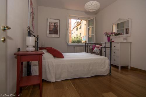 En eller flere senge i et værelse på Casa Piaggia