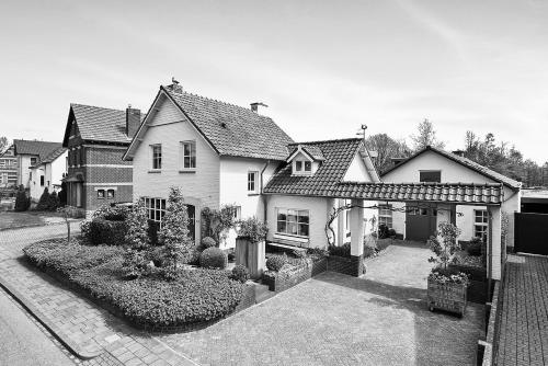 a black and white photo of a house at Sibbliem Luxury Homestay in Valkenburg