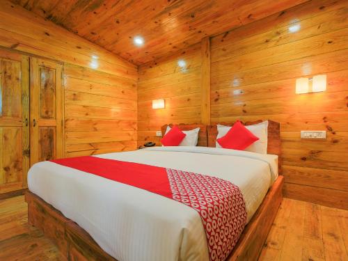 Säng eller sängar i ett rum på Brushwood Villa Resort