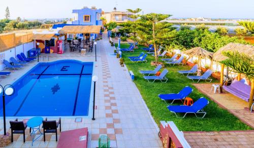 an overhead view of the pool at the hotel at Eltina Apartments in Malia