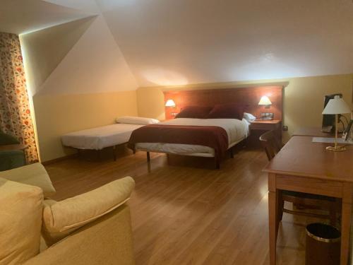 Postel nebo postele na pokoji v ubytování Hotel Camino Real
