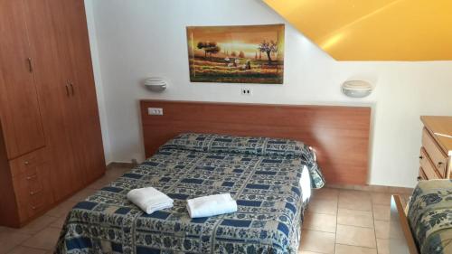 Ein Bett oder Betten in einem Zimmer der Unterkunft Hotel Miramonti