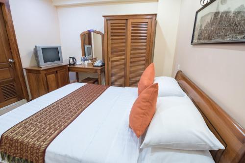 Un ou plusieurs lits dans un hébergement de l'établissement Neth Socheata Hotel