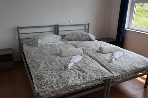 Postel nebo postele na pokoji v ubytování ARA-MARINA