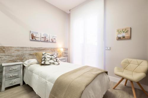 En eller flere senge i et værelse på Urban Sabadell