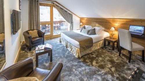 Säng eller sängar i ett rum på Hotel La Chaudanne