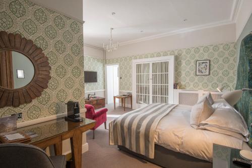 Katil atau katil-katil dalam bilik di Wentbridge House Hotel