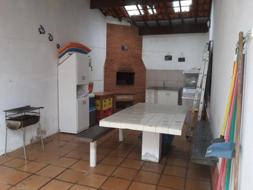 Кухня или кухненски бокс в Casa em Itanhaém