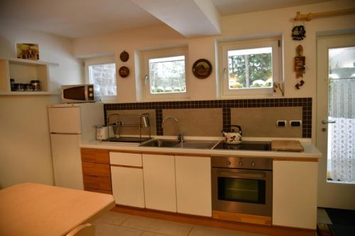 Cucina o angolo cottura di Chalet Villa Bianca