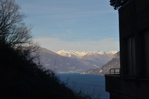 a view of a lake with mountains in the background at Appartamenti Lago di Como in Valbrona