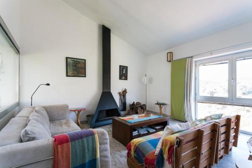 Χώρος καθιστικού στο Casa de los Olivos, chimenea con horno 2 Hab 4 Pers mas 1 Max