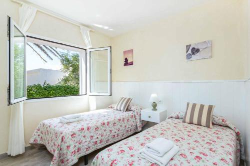 Postel nebo postele na pokoji v ubytování Villa Marismas Sombra