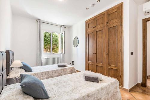 Postel nebo postele na pokoji v ubytování Villa Oratge