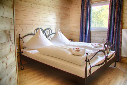 Ένα ή περισσότερα κρεβάτια σε δωμάτιο στο Wildberghof