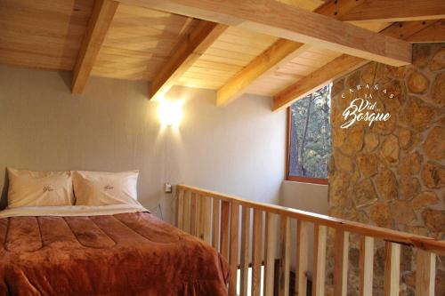 Posteľ alebo postele v izbe v ubytovaní Cabañas La Vid Del Bosque