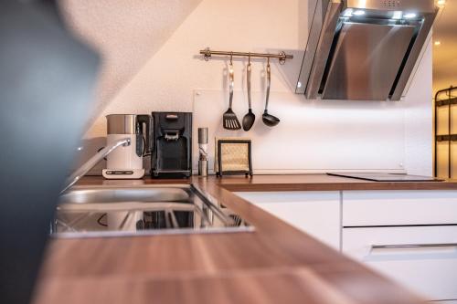 Η κουζίνα ή μικρή κουζίνα στο Ganze Wohnung in Bad Buchau am Federsee