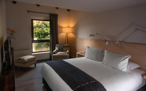 Postel nebo postele na pokoji v ubytování Hotel Boutique Casadoca