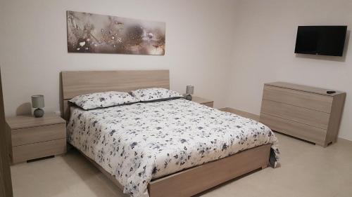A bed or beds in a room at A casa di Pamy