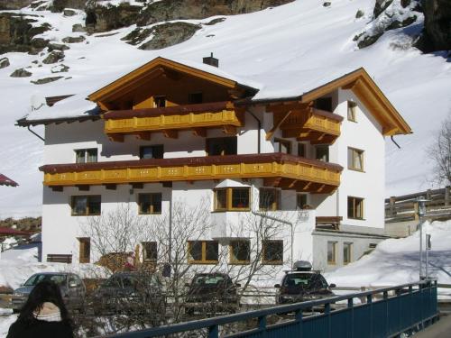 a building with snow on top of it at Haus Birkenheim in Sölden