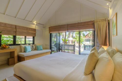 Postel nebo postele na pokoji v ubytování Paradise Beach Resort, Koh Samui - SHA Extra Plus