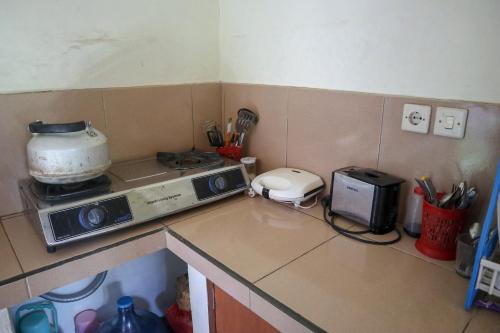 Una cocina o zona de cocina en Ubud Canti House