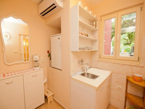 Kuchyňa alebo kuchynka v ubytovaní Rooms Nadica