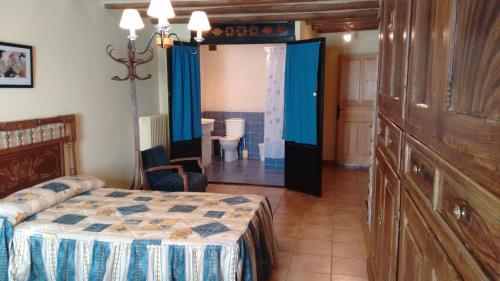Postel nebo postele na pokoji v ubytování Casa Blasco