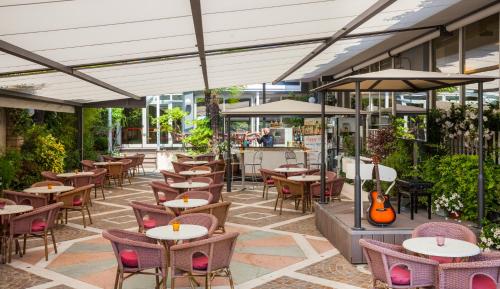 Hotel Continental - Tonelli Hotelsにあるレストランまたは飲食店