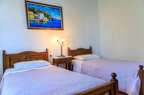 Кровать или кровати в номере Anatoli Villa