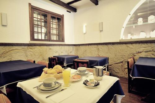 Гостиная зона в Rainha Santa Isabel - Óbidos History Hotel