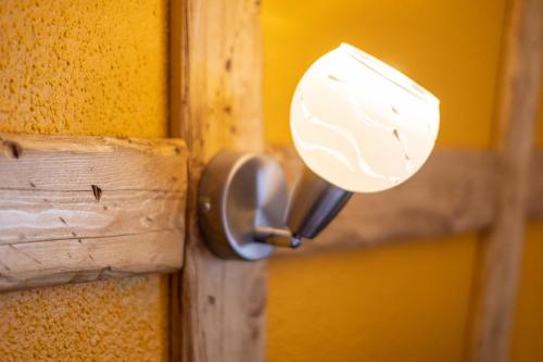 a close up of a door with a knob at The Originals City Hotel de l Ange Guebwiller in Guebwiller
