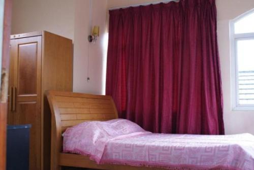 Cama o camas de una habitación en Villa Les Aigrettes