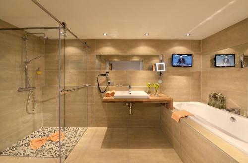 Ванна кімната в Parkhotel Oberhausen